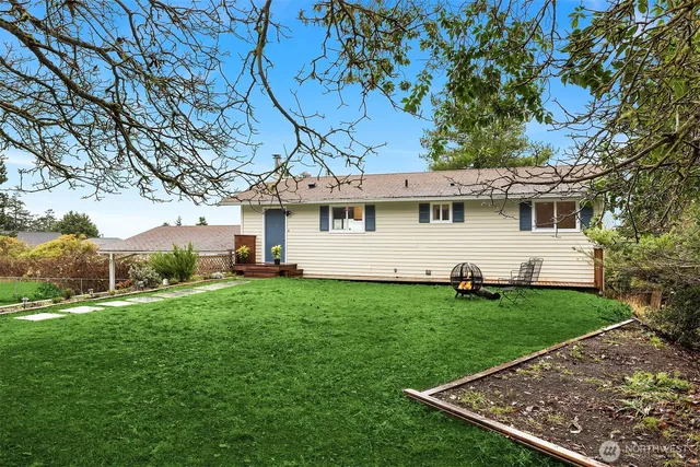 a view of a backyard with a garden