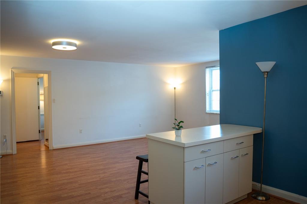 5025 Fifth Avenue, Unit 3F Pittsburgh, PA 15232 - Photo 3 of 22 a bathroom with a sink and a mirror
