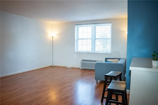 a workspace with furniture and a window