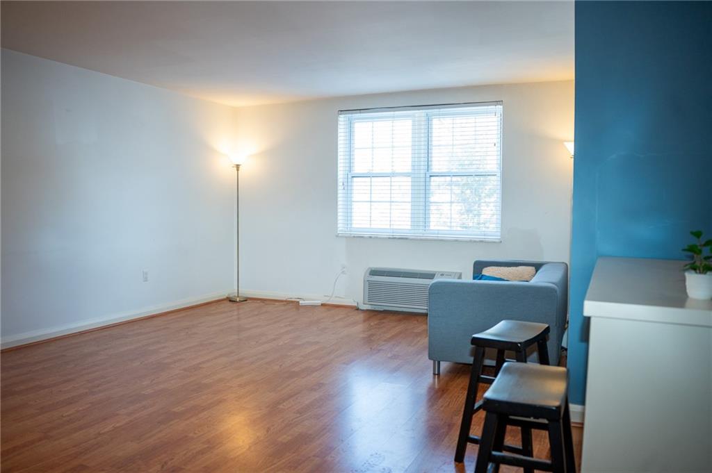 5025 Fifth Avenue, Unit 3F Pittsburgh, PA 15232 - Photo 8 of 22 a workspace with furniture and a window