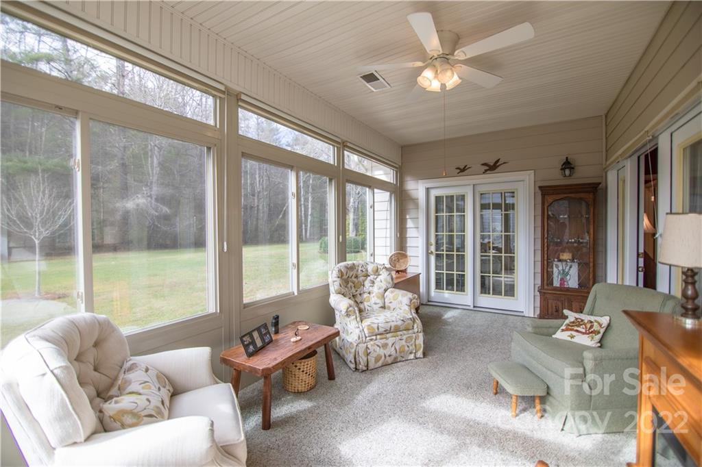 7 Sheffield Place Brevard, NC 28712 - Photo 9 of 30 a living room with furniture and a large window with outer view