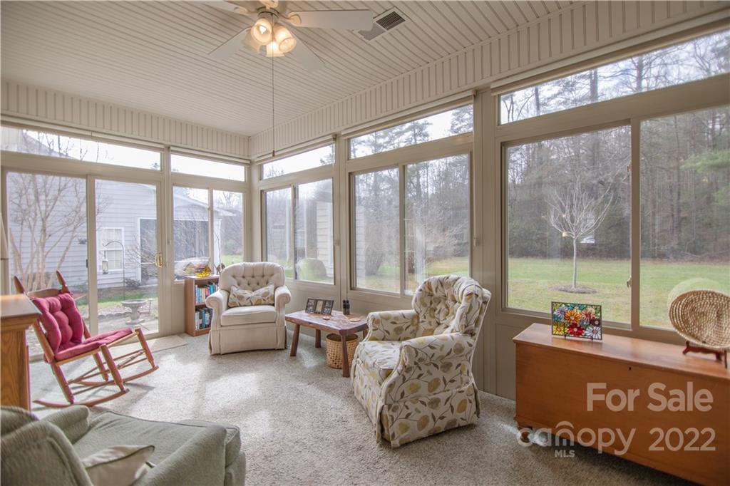 7 Sheffield Place Brevard, NC 28712 - Photo 10 of 30 a living room with furniture and a large window