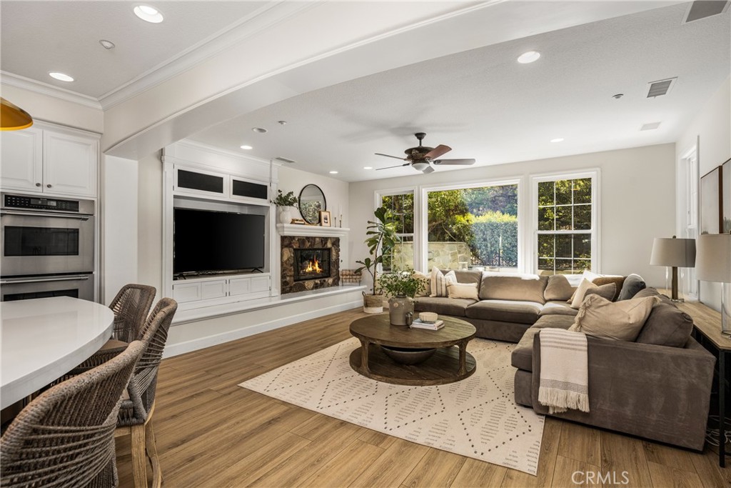 4 Lewiston Court Ladera Ranch, CA 92694 - Photo 9 of 48 a living room with furniture kitchen view and a large window