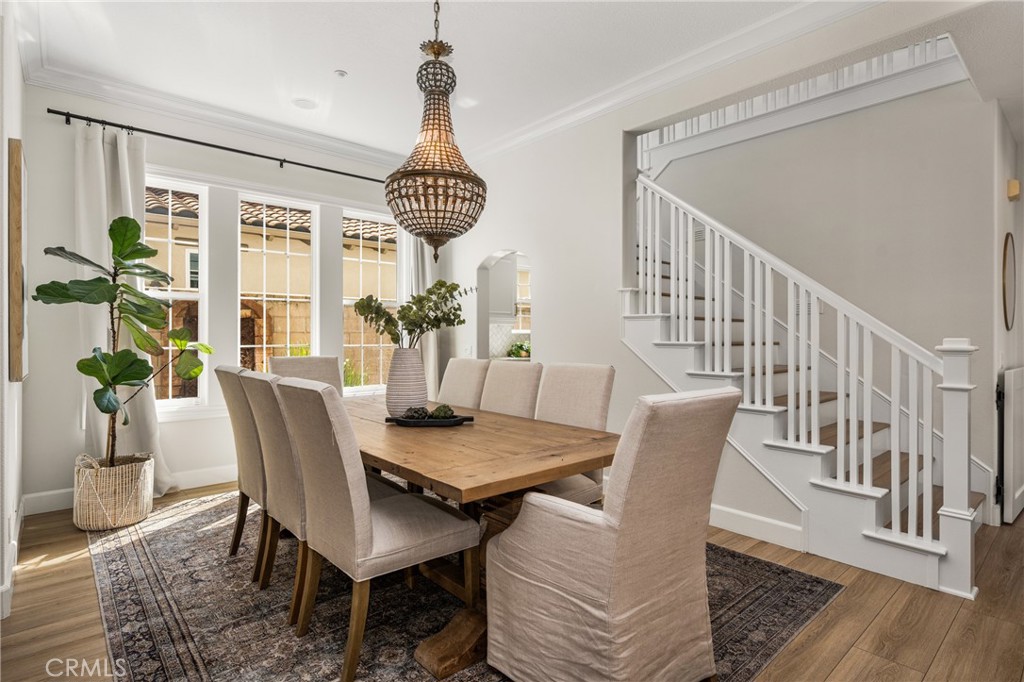 4 Lewiston Court Ladera Ranch, CA 92694 - Photo 15 of 48 a view of a dining room with furniture window and wooden floor