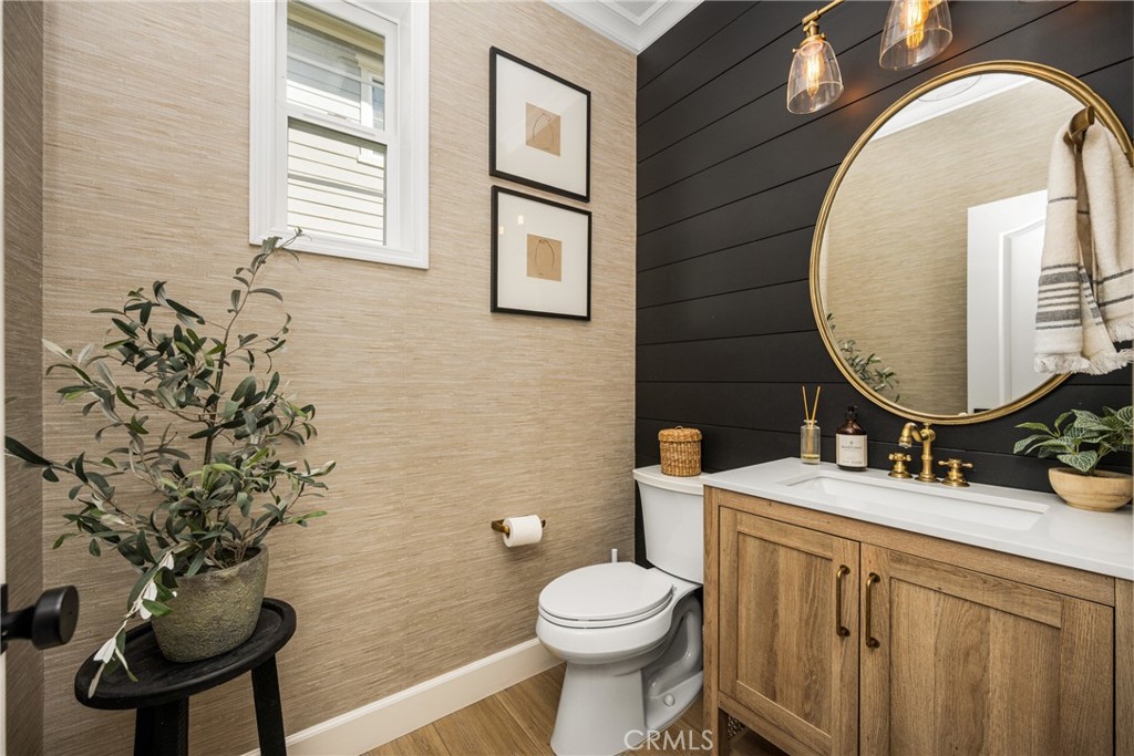 4 Lewiston Court Ladera Ranch, CA 92694 - Photo 20 of 48 a bathroom with a sink mirror vanity and toilet