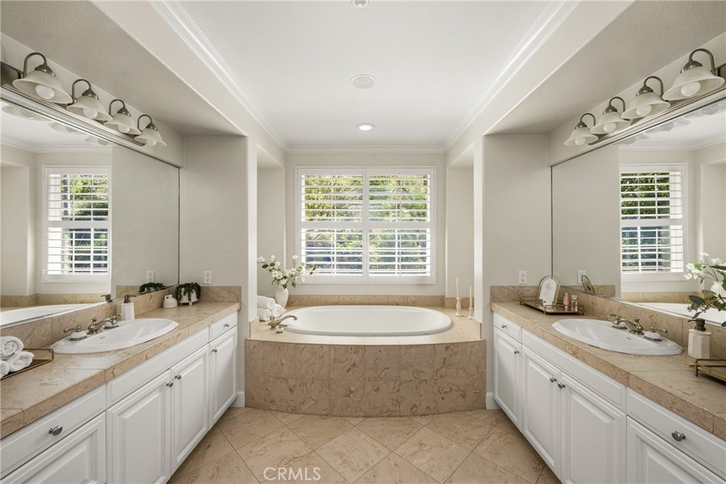 4 Lewiston Court Ladera Ranch, CA 92694 - Photo 25 of 48 a spacious bathroom with sink shower double vanity