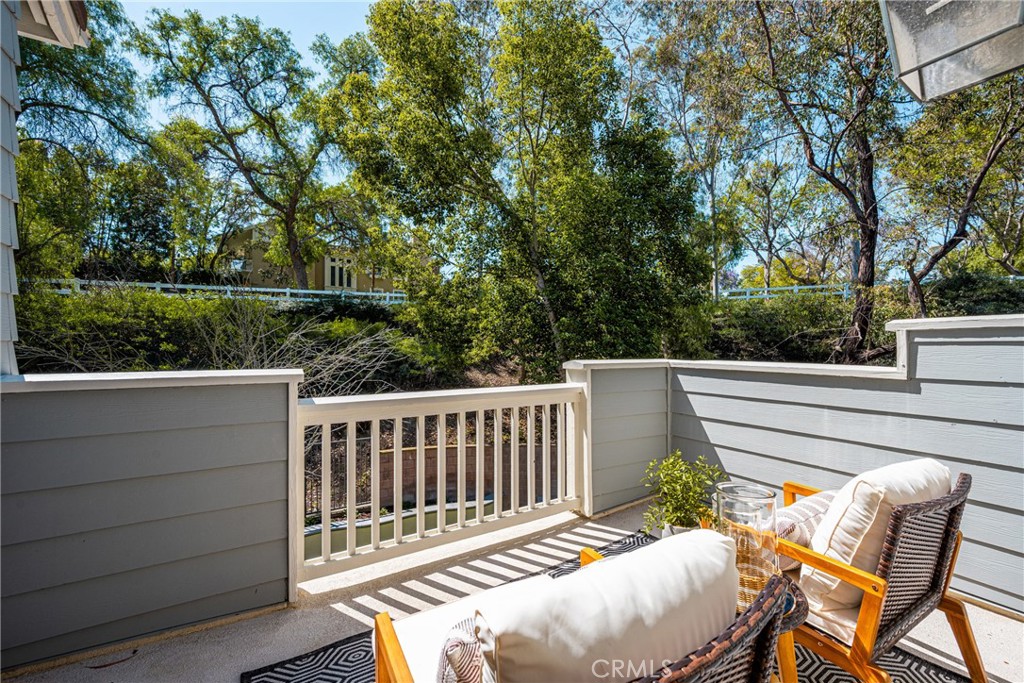 4 Lewiston Court Ladera Ranch, CA 92694 - Photo 28 of 48 a view of balcony with wooden floor and outdoor seating