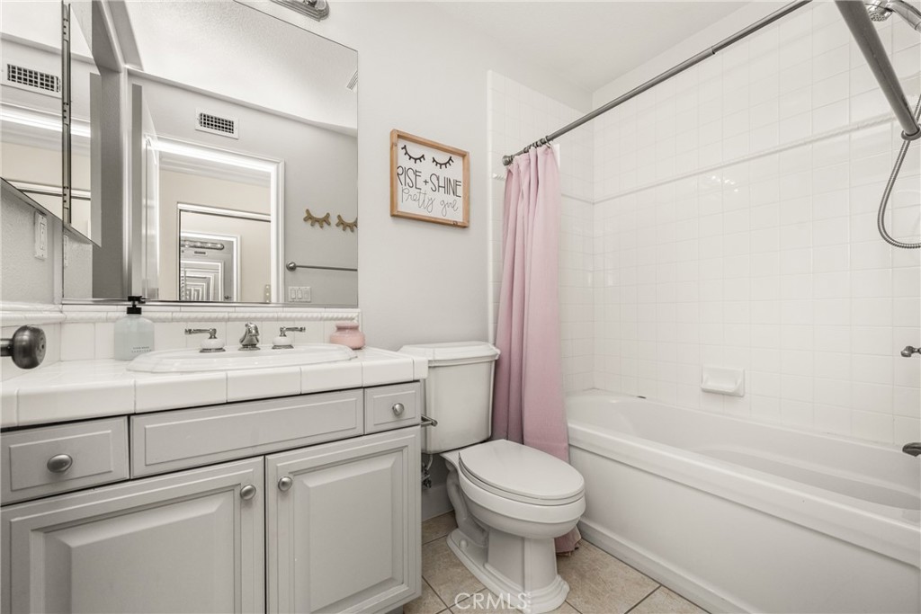 4 Lewiston Court Ladera Ranch, CA 92694 - Photo 30 of 48 a bathroom with a sink a toilet and shower