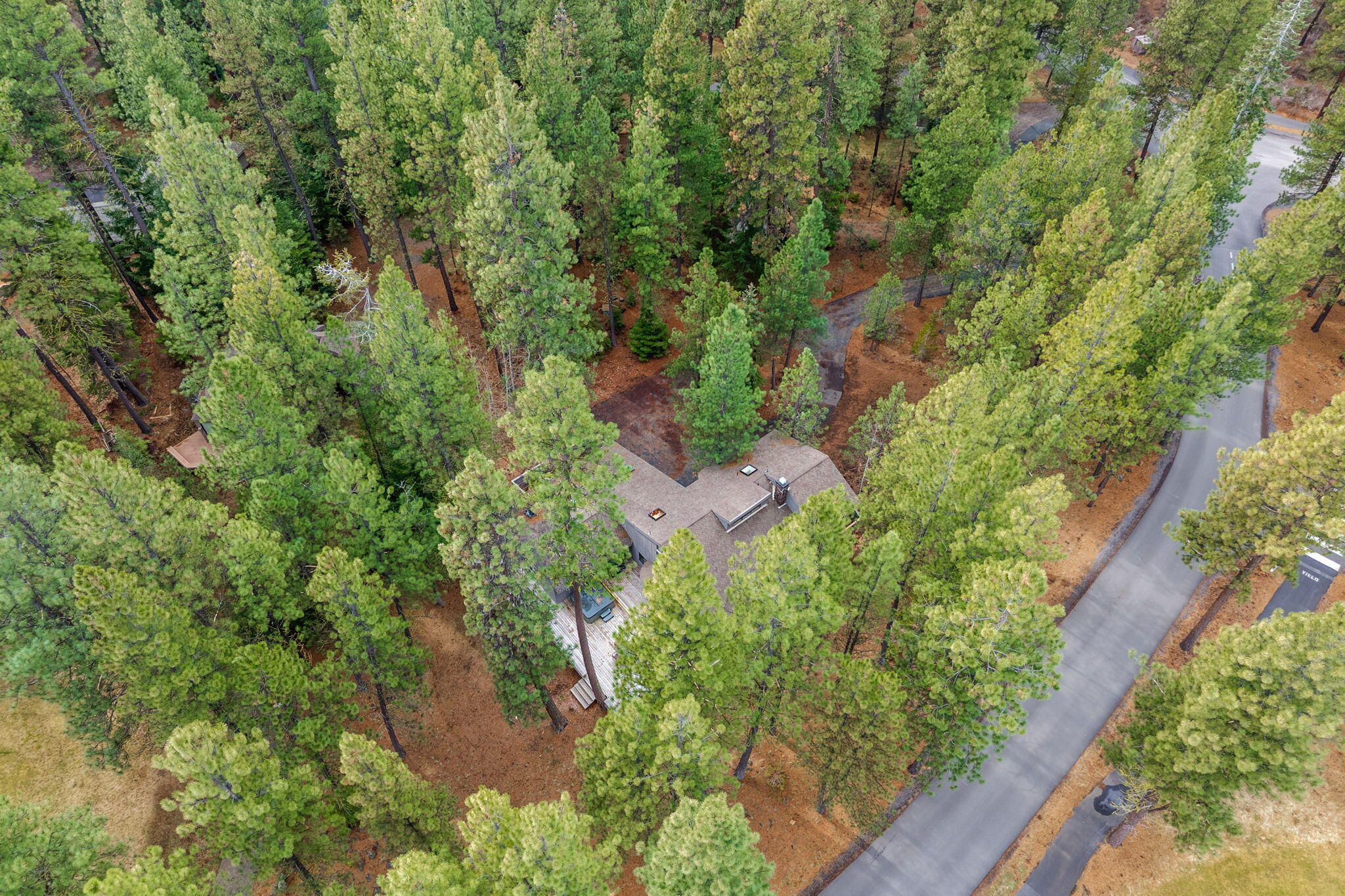 13168 Hawks Beard Black Butte Ranch, OR 97759 - Photo 47 of 47 an aerial view of a house with a yard