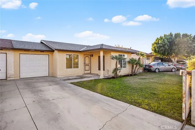 a house view with a garden space