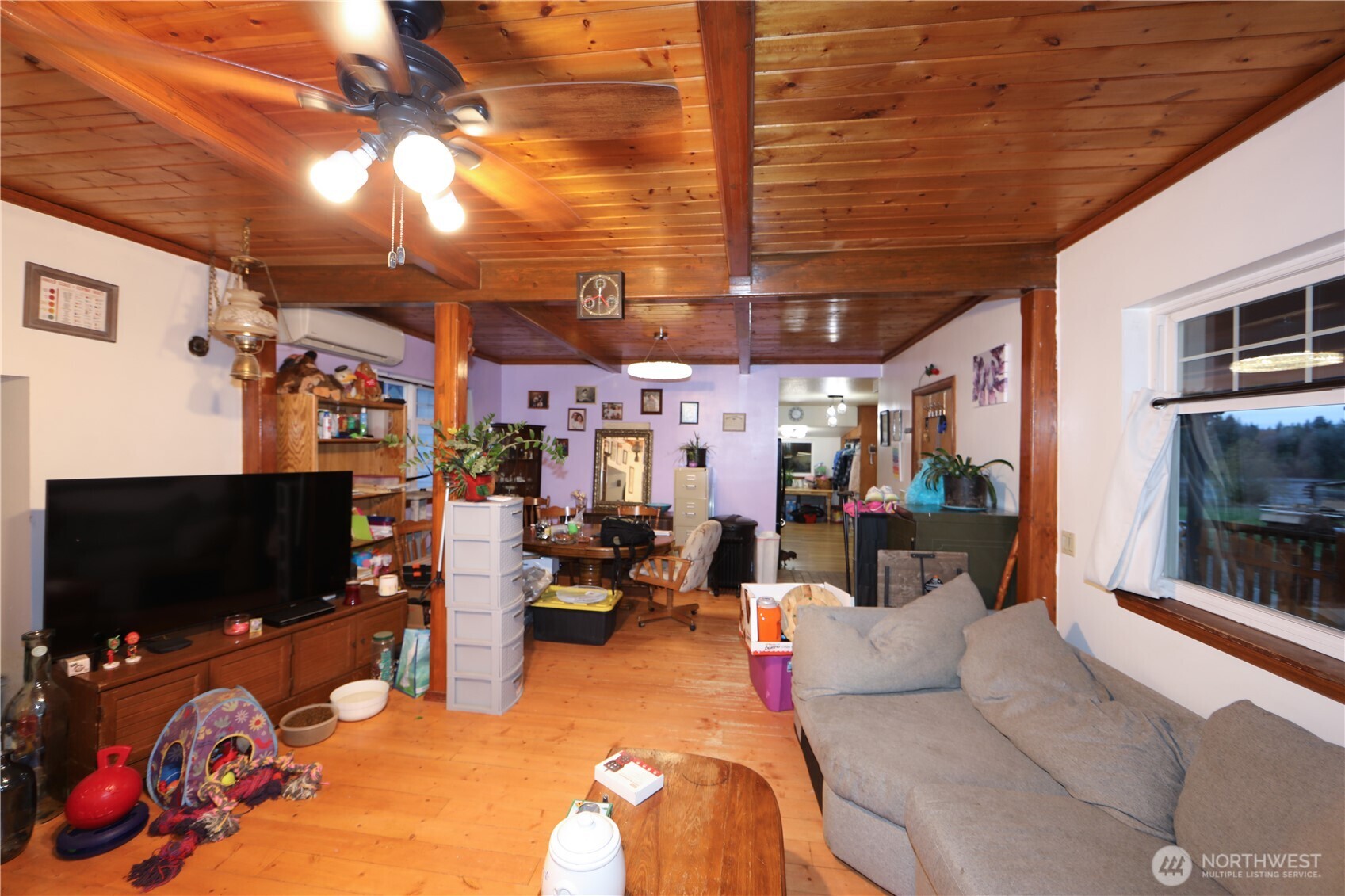 3619 Shincke Road Northeast Olympia, WA 98506 - Photo 17 of 28 a living room with lots of furniture and a flat screen tv