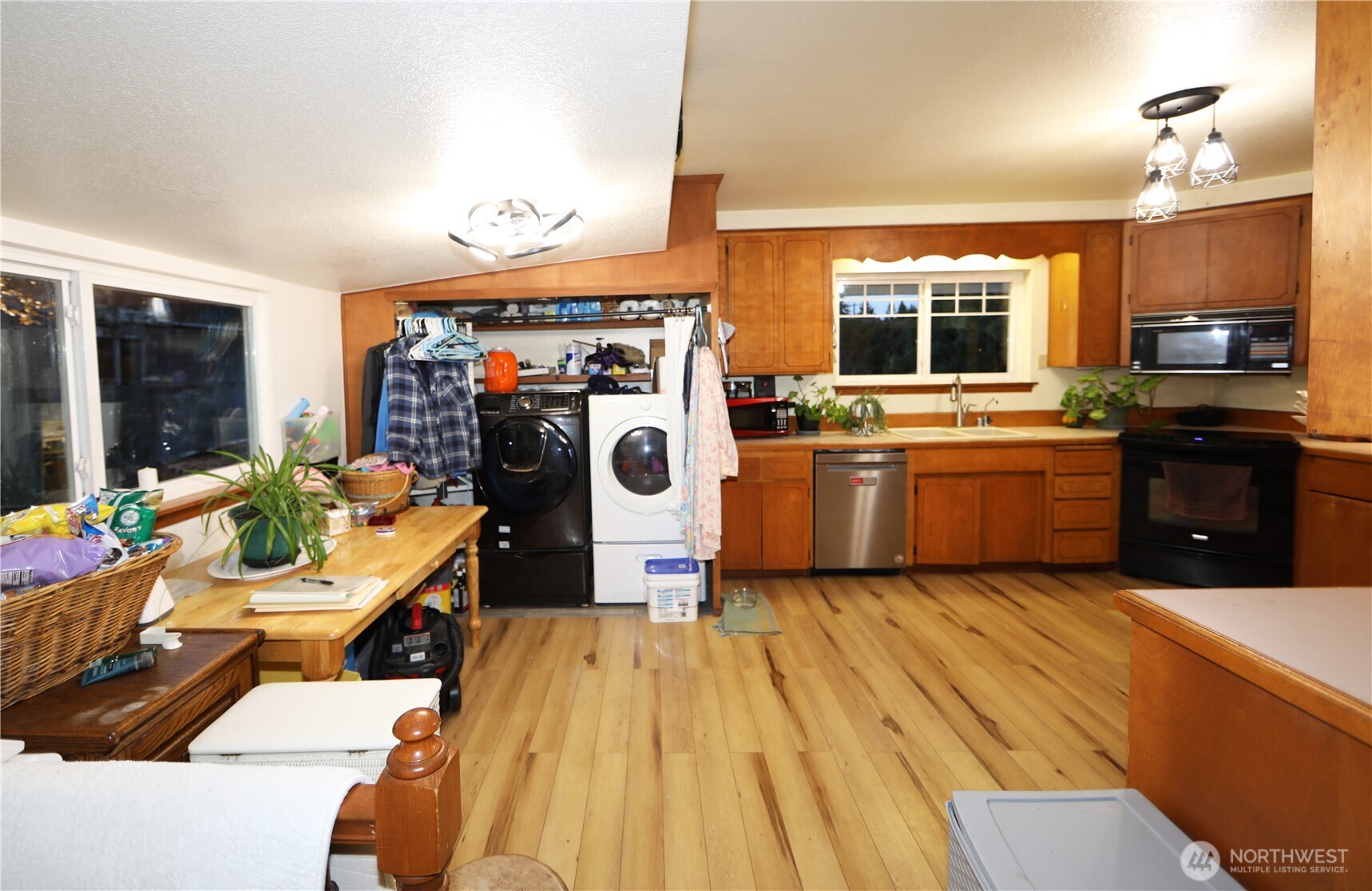 3619 Shincke Road Northeast Olympia, WA 98506 - Photo 19 of 28 a view of a kitchen with a sink and a stove top oven