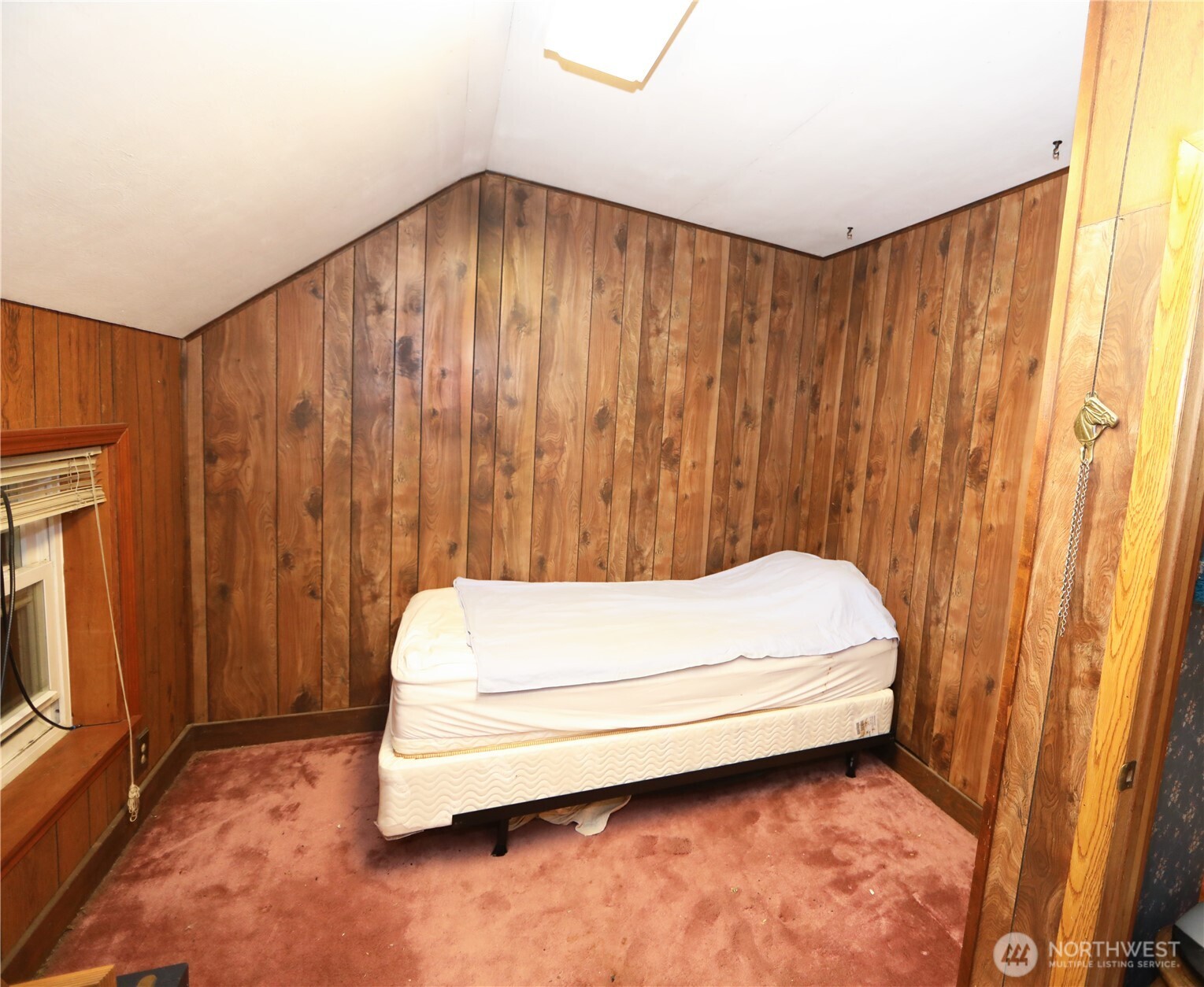 3619 Shincke Road Northeast Olympia, WA 98506 - Photo 26 of 28 a bathroom with a white tub and shower curtain
