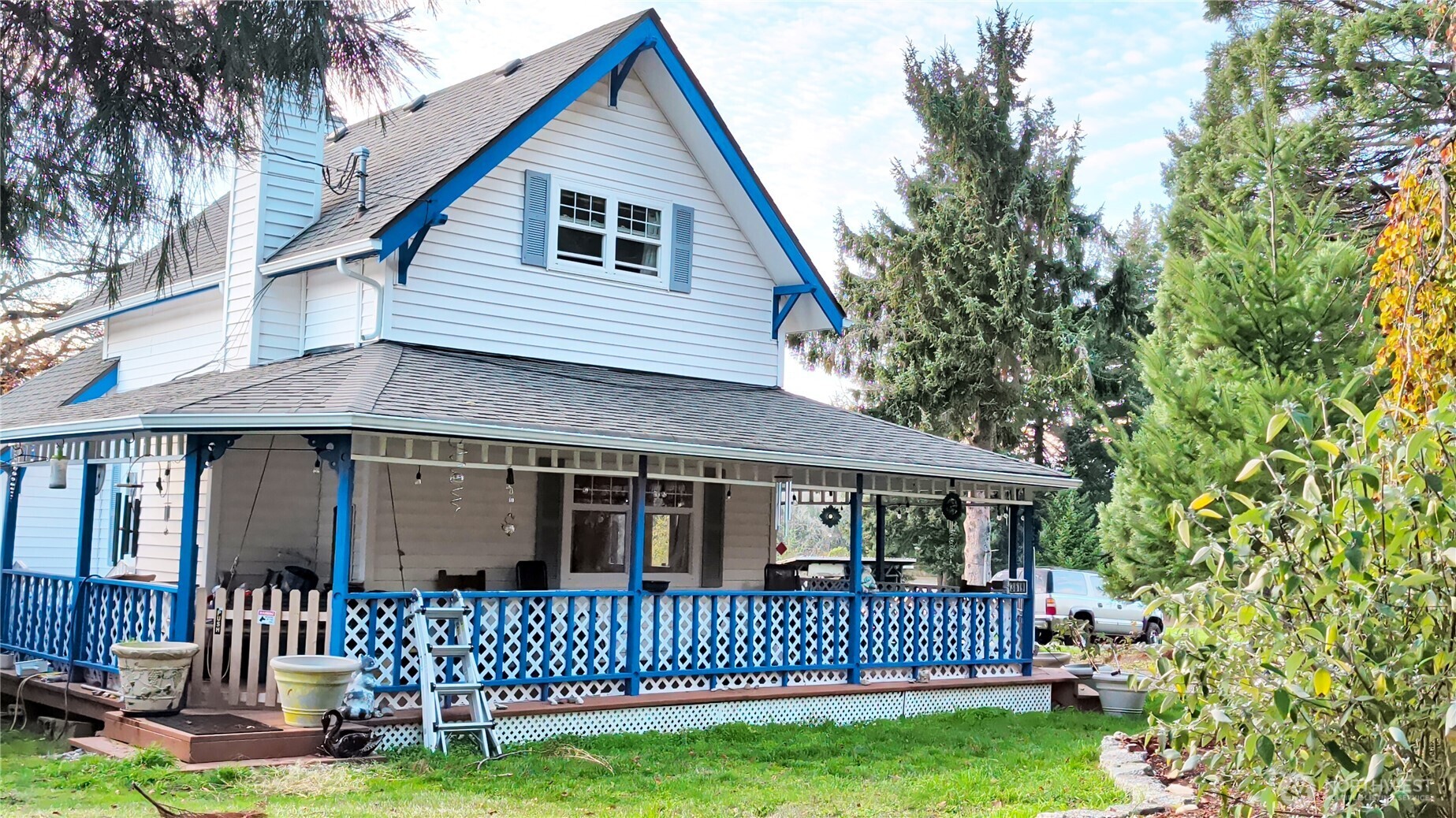 3619 Shincke Road Northeast Olympia, WA 98506 - Photo 3 of 28 a front view of a house with a garden and deck