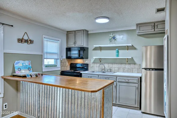 $449,900 | 209 South Wells Street, Panama City Beach, FL 32413