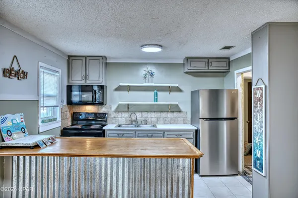 $449,900 | 209 South Wells Street, Panama City Beach, FL 32413