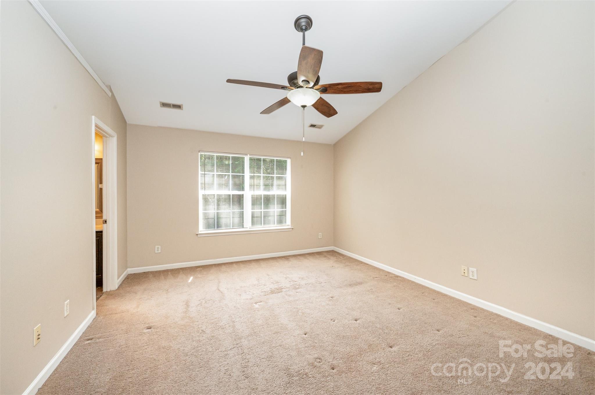 12032 Regent Ridge Lane Charlotte, NC 28278 - Photo 13 of 25 a view of an empty room with a window