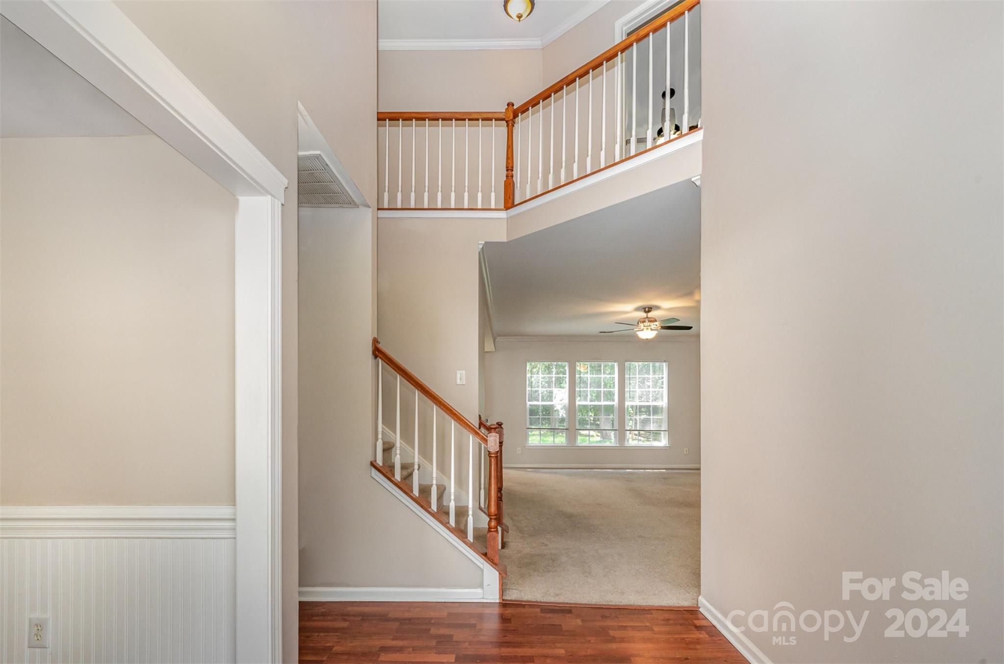 12032 Regent Ridge Lane Charlotte, NC 28278 - Photo 2 of 25 a view of staircase with railing and a stairs