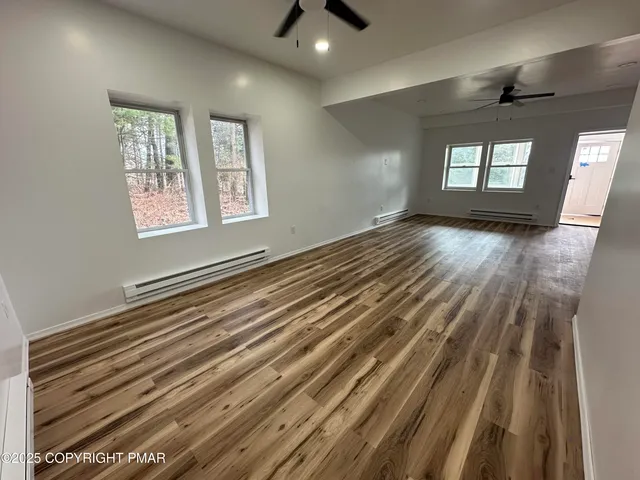 a view of an empty room and window