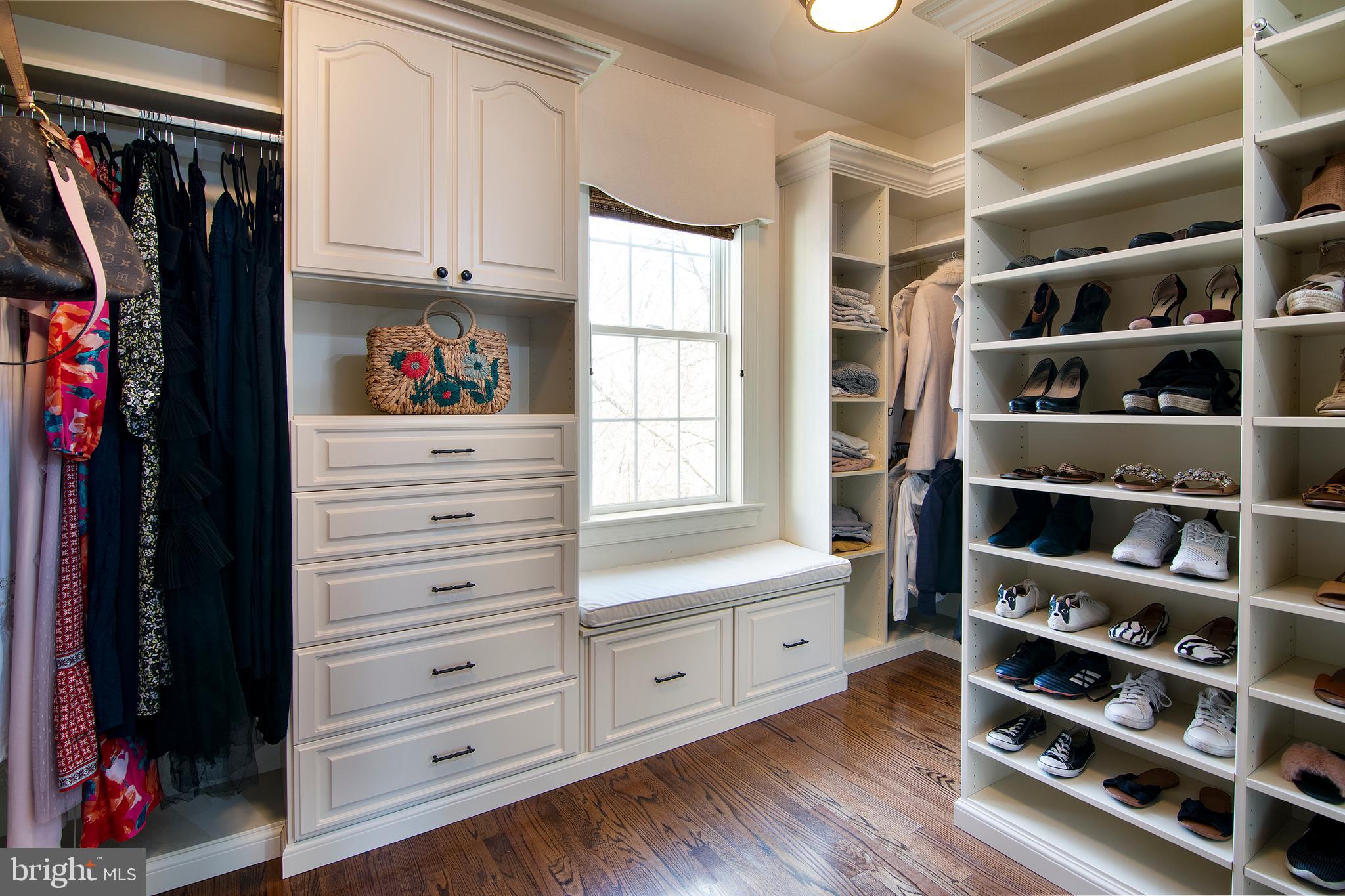 1428 County Line Road Bryn Mawr, PA 19010 - Photo 21 of 31 a view of walk in closet with clothes and shoes