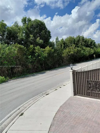 a view of a terrace with yard