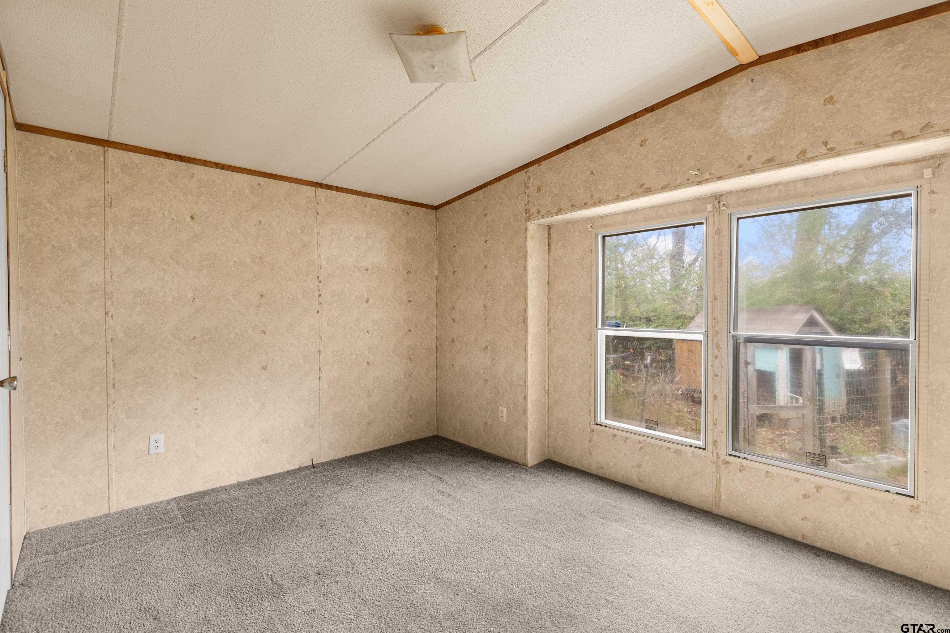 200 County Road 2123 Longview, TX 75603 - Photo 19 of 22 a view of an empty room with a window