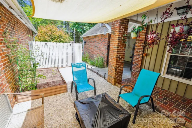 a view of an chairs and tables in the patio