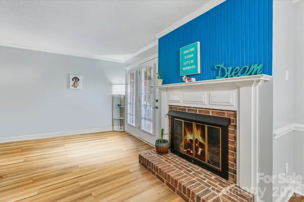 a living room with a fireplace