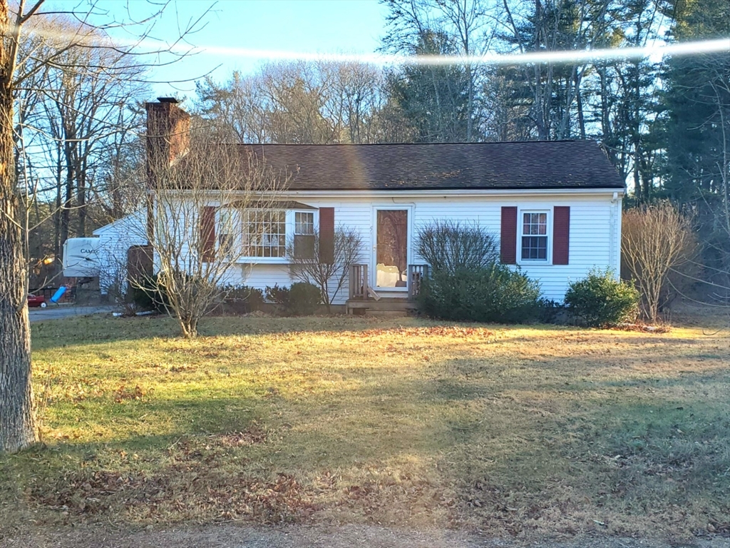 a front view of house with yard