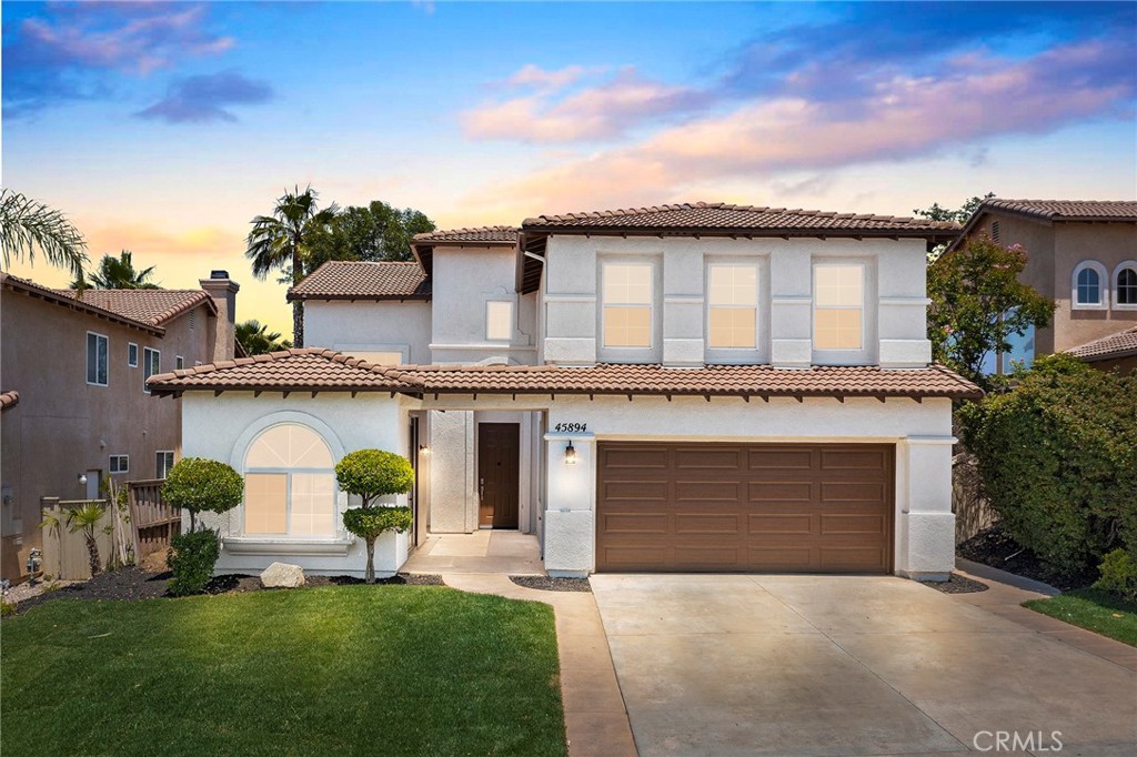 45894 Paseo Gallante Temecula, CA 92592 - Photo 1 of 1 a front view of a house with a garden and plants