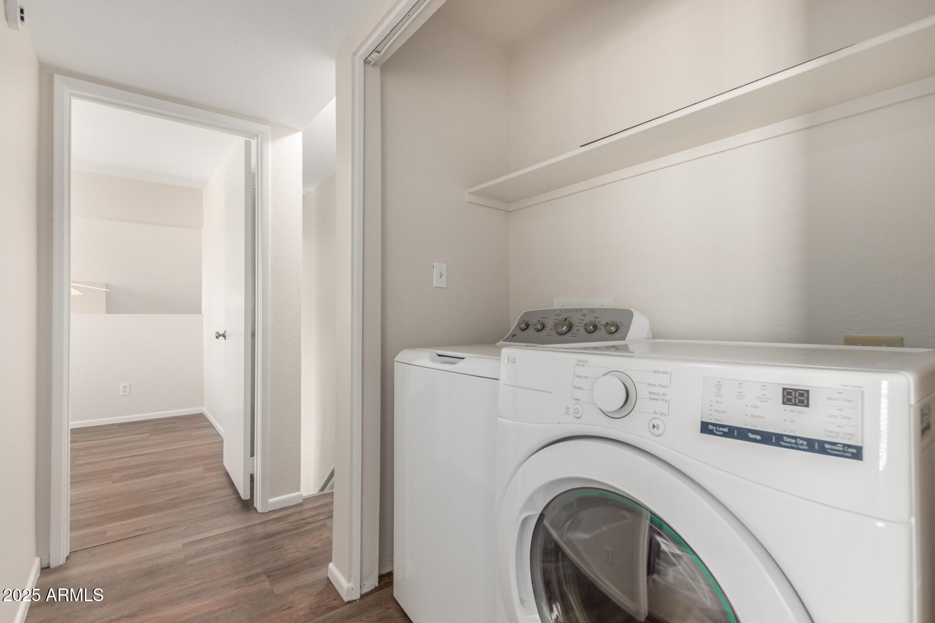 1126 West Elliot Road, Unit 1010 Chandler, AZ 85224 - Photo 19 of 32 a utility room with dryer and washer
