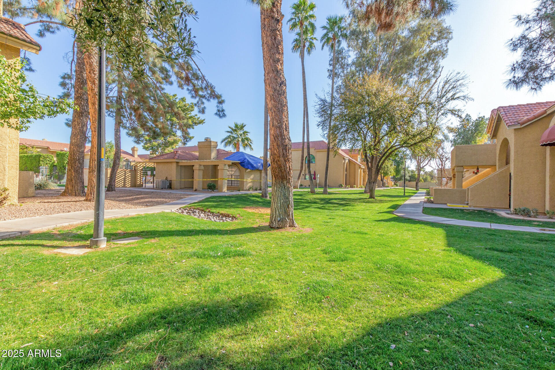 1126 West Elliot Road, Unit 1010 Chandler, AZ 85224 - Photo 30 of 32 a view of a park with a slide