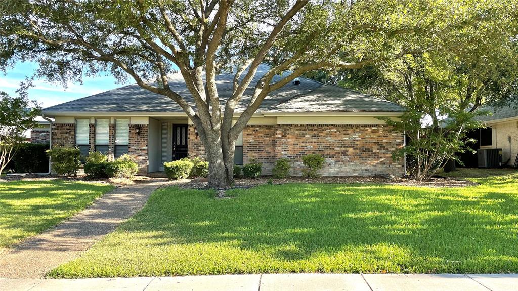 1408 Geneva Lane Plano, TX 75075 - Photo 1 of 1 front view of a house with a yard