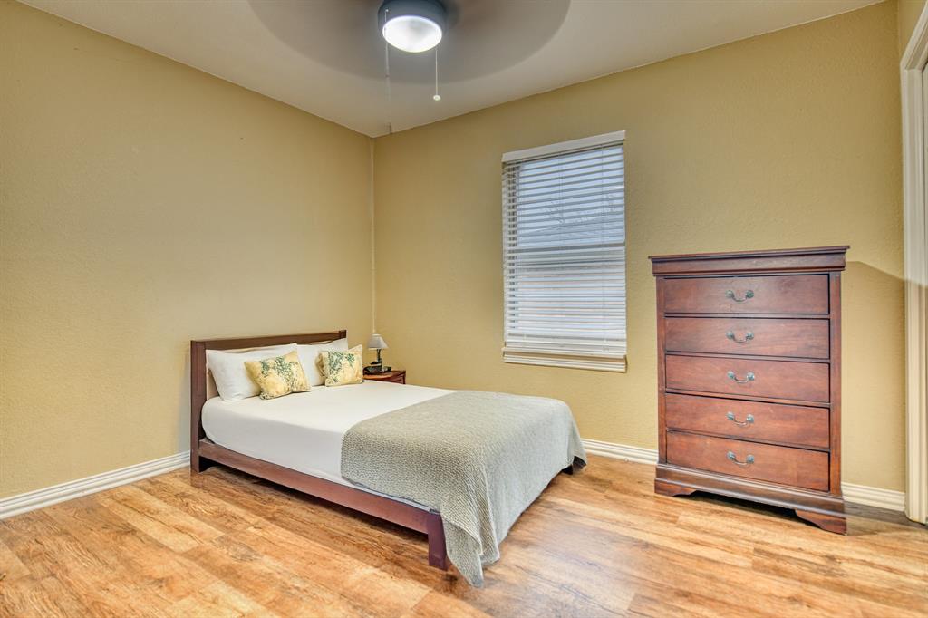 1304 Crestview Drive Kaufman, TX 75142 - Photo 11 of 26 a bedroom with a bed and a dresser