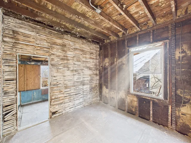 a view of a porch with a door