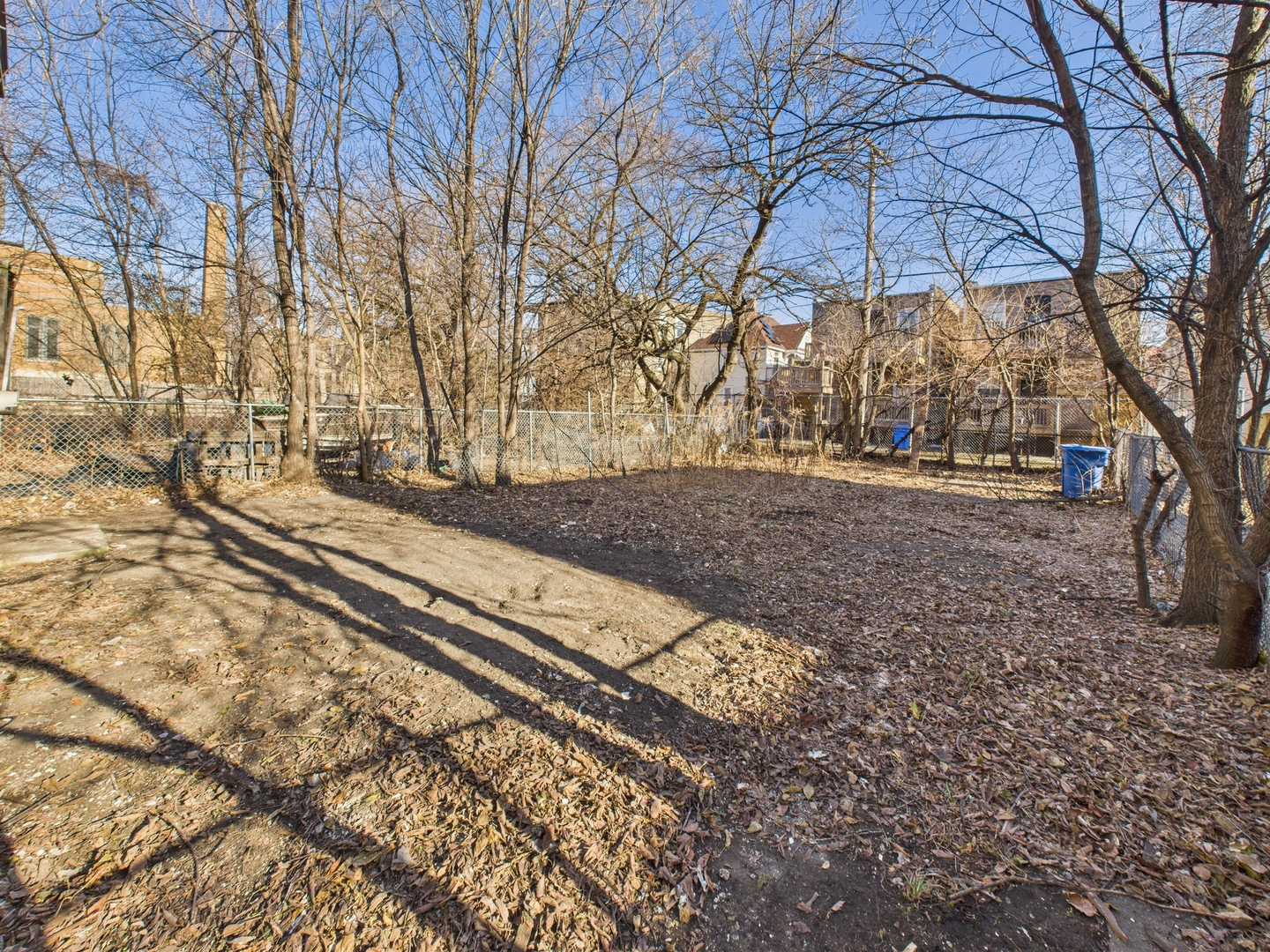7047 South Princeton Avenue Chicago, IL 60621 - Photo 22 of 23 a view of a yard with an umbrella
