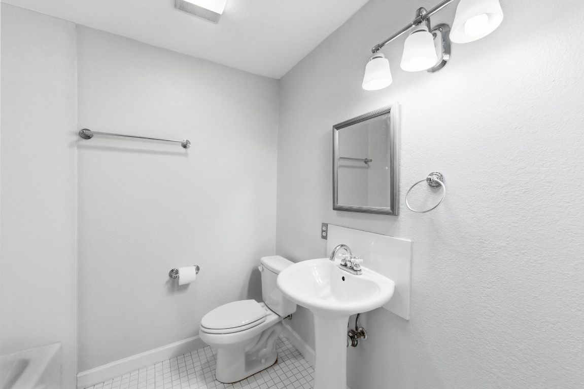 6210 Shadow Valley Drive, Unit B Austin, TX 78731 - Photo 22 of 28 Secondary bathroom with shower/tub and tile patterned flooring