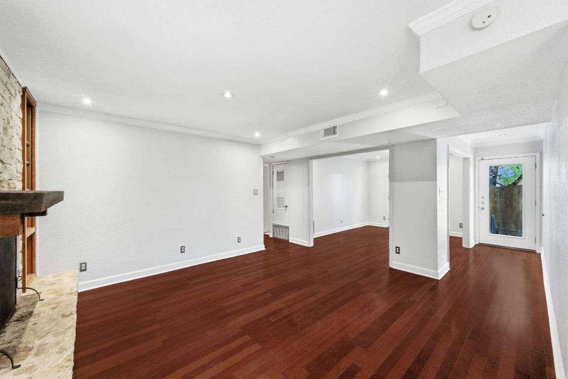 6210 Shadow Valley Drive, Unit B Austin, TX 78731 - Photo 6 of 28 Living room open to office area at the front of the unit
