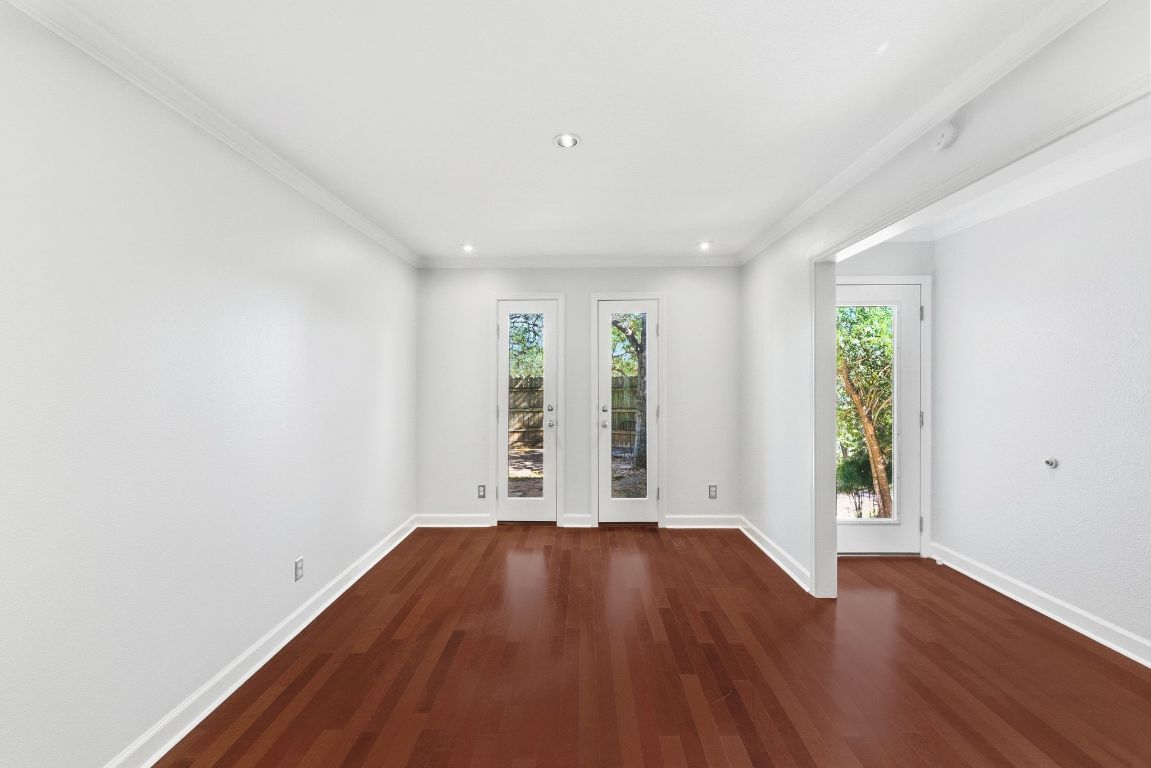 6210 Shadow Valley Drive, Unit B Austin, TX 78731 - Photo 8 of 28 Open office area at the front of the unit. Could be used as third bedroom.