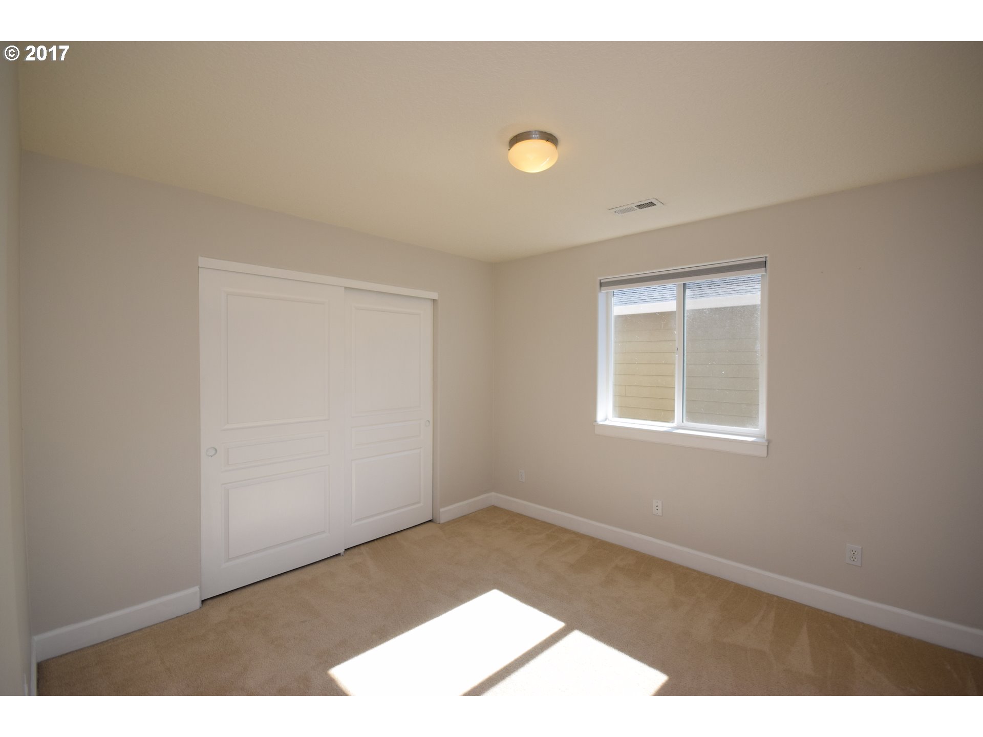 5229 Northwest Shoreline Way Portland, OR 97229 - Photo 18 of 29 an empty room with windows