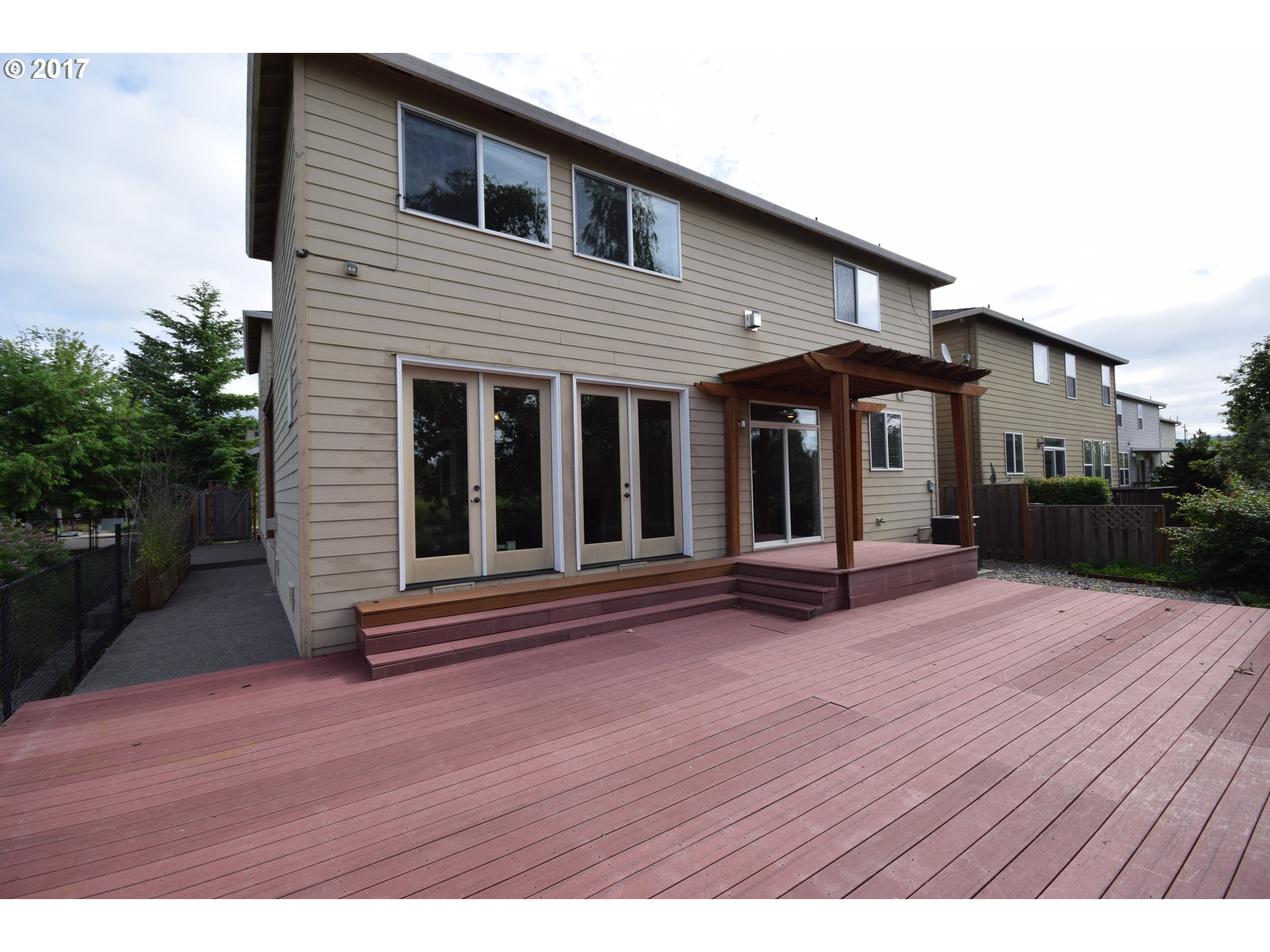 5229 Northwest Shoreline Way Portland, OR 97229 - Photo 28 of 29 a view of a house with wooden floor