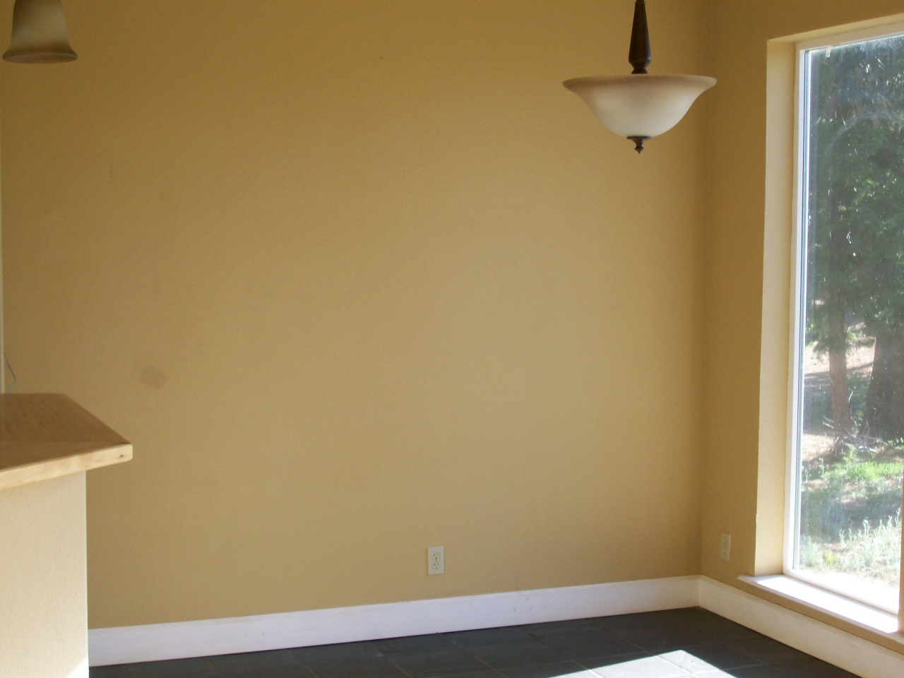 32990 Torrey Pines Road Shingletown, CA 96088 - Photo 7 of 9 a view of a small space with wooden floor and a window