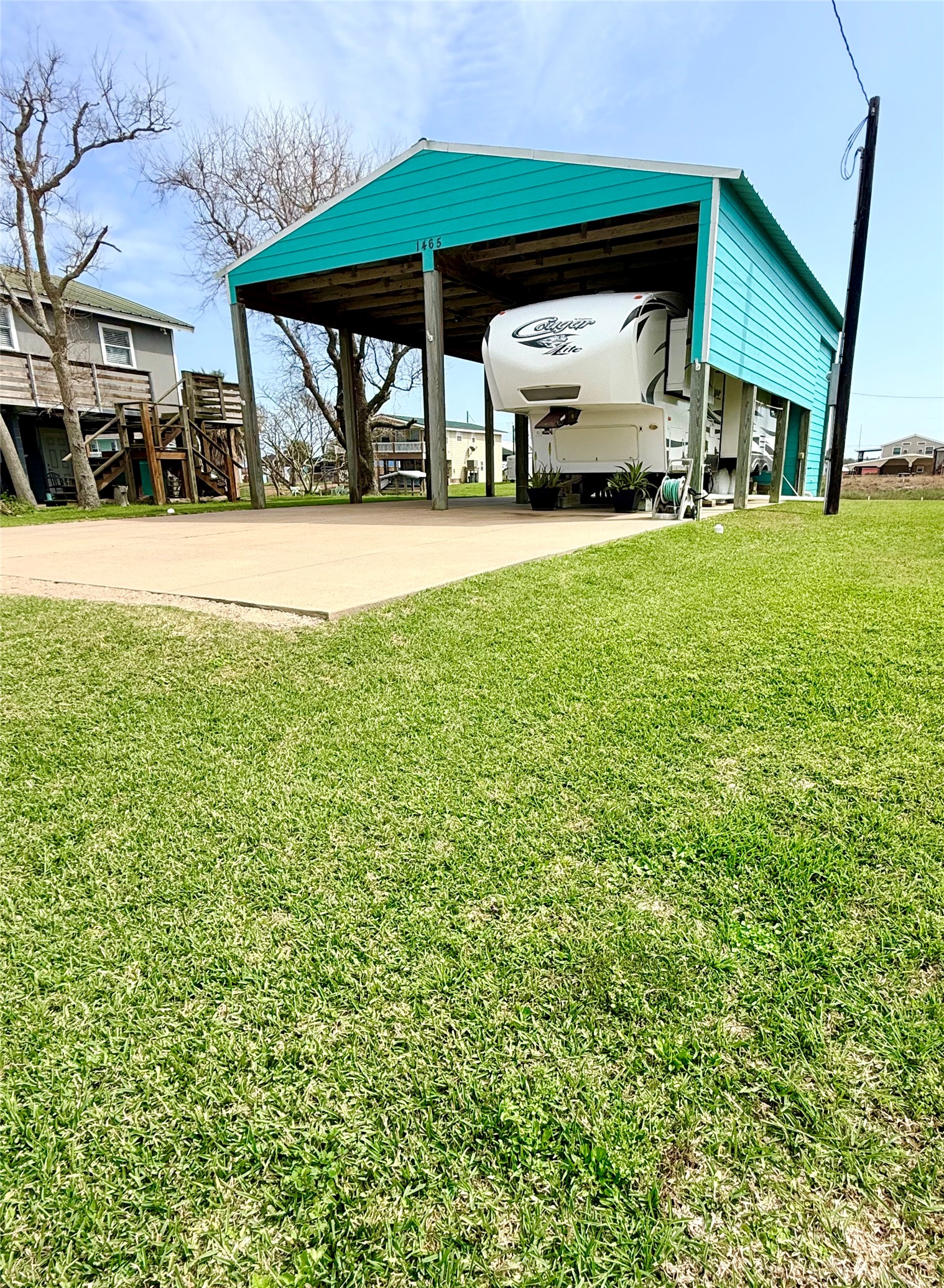 Lot 49-blk Sec 3 County Road 201 Sargent, TX 77414 - Photo 23 of 30 a view of house with yard and outdoor seating