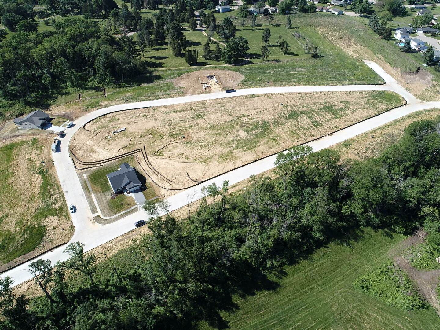 907 Riverstone Road Clinton, IA 52732 - Photo 3 of 4 an aerial view of a house with a yard