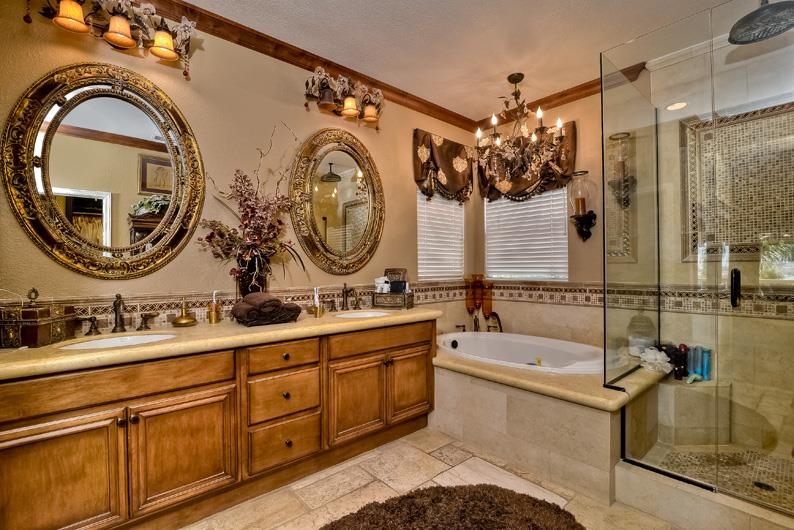 1206 Plum Tree Road Carlsbad, CA 92011 - Photo 21 of 25 COMPLETELY REMOVATED MASTER BATHROOM WITH SEPERATE JETTED TUB, CUSTOM SHOWER FIXTURES, DOUBLE SINKS, AND WALK-IN CLOSET WITH BUILT-INS INCLUDING KEYED JEWELRY DRAWER