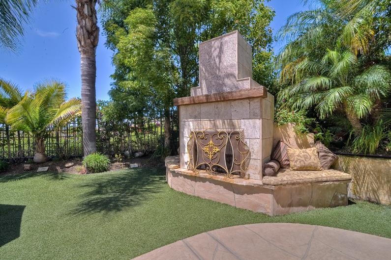 1206 Plum Tree Road Carlsbad, CA 92011 - Photo 6 of 25 ENJOY EVENINGS WITH OUTDOOR FIREPLACE WITH SITTING AREAS