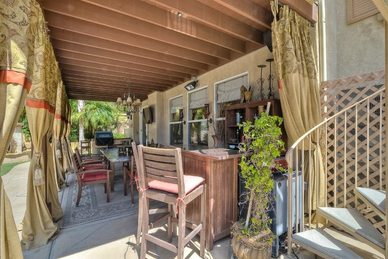 1206 Plum Tree Road Carlsbad, CA 92011 - Photo 8 of 25 SPIRAL STAIRCASE TO MASTER SUITE BALCONY