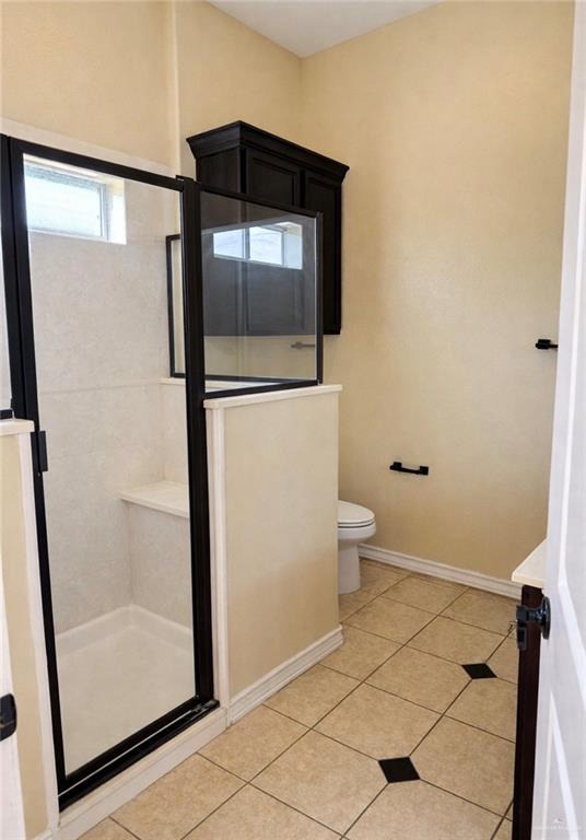 3207 Omega Street Edinburg, TX 78539 - Photo 12 of 13 a bathroom with a granite countertop sink and a mirror
