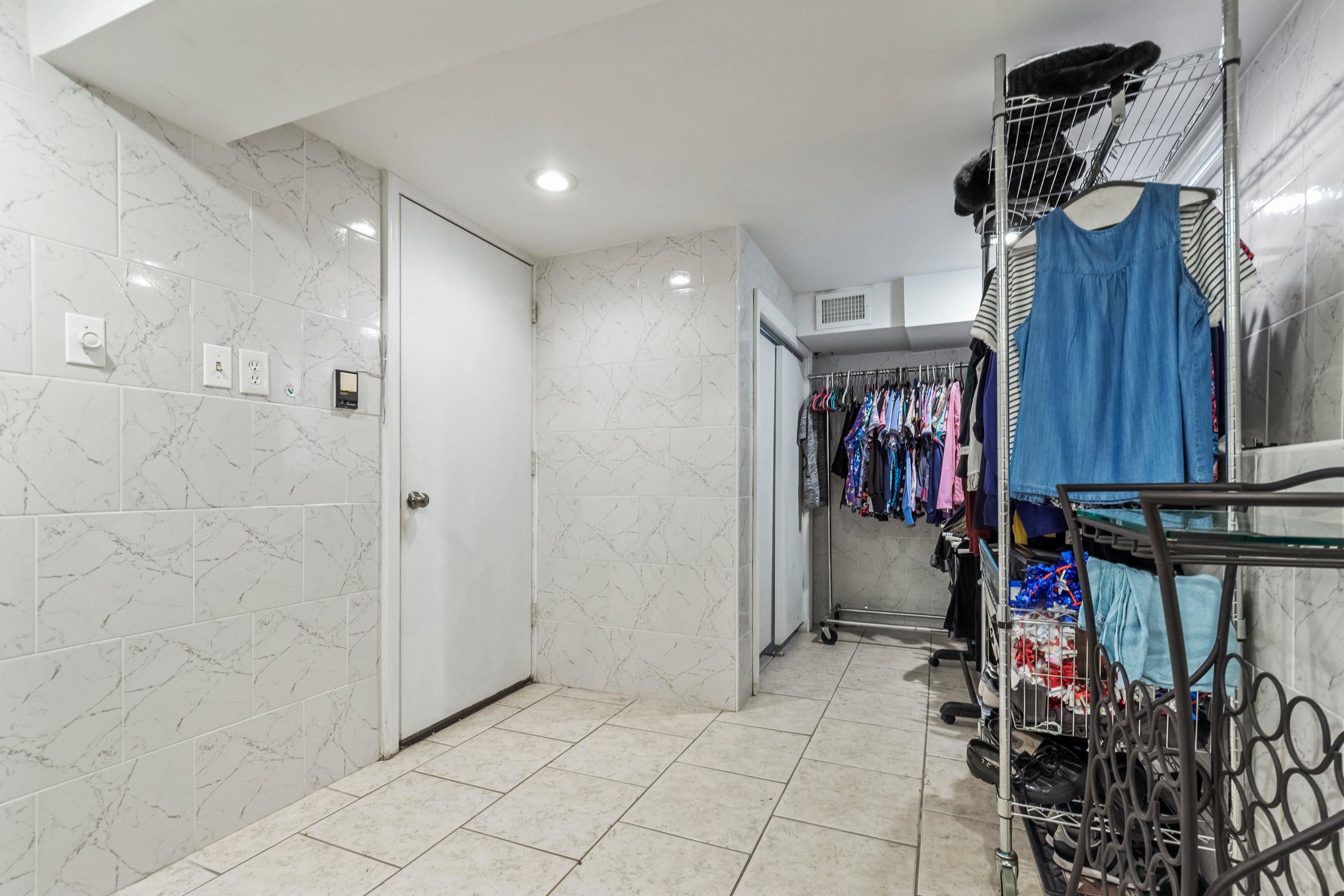 108 Country Village Road Jersey City, NJ 07305 - Photo 11 of 12 a view of a storage & utility room