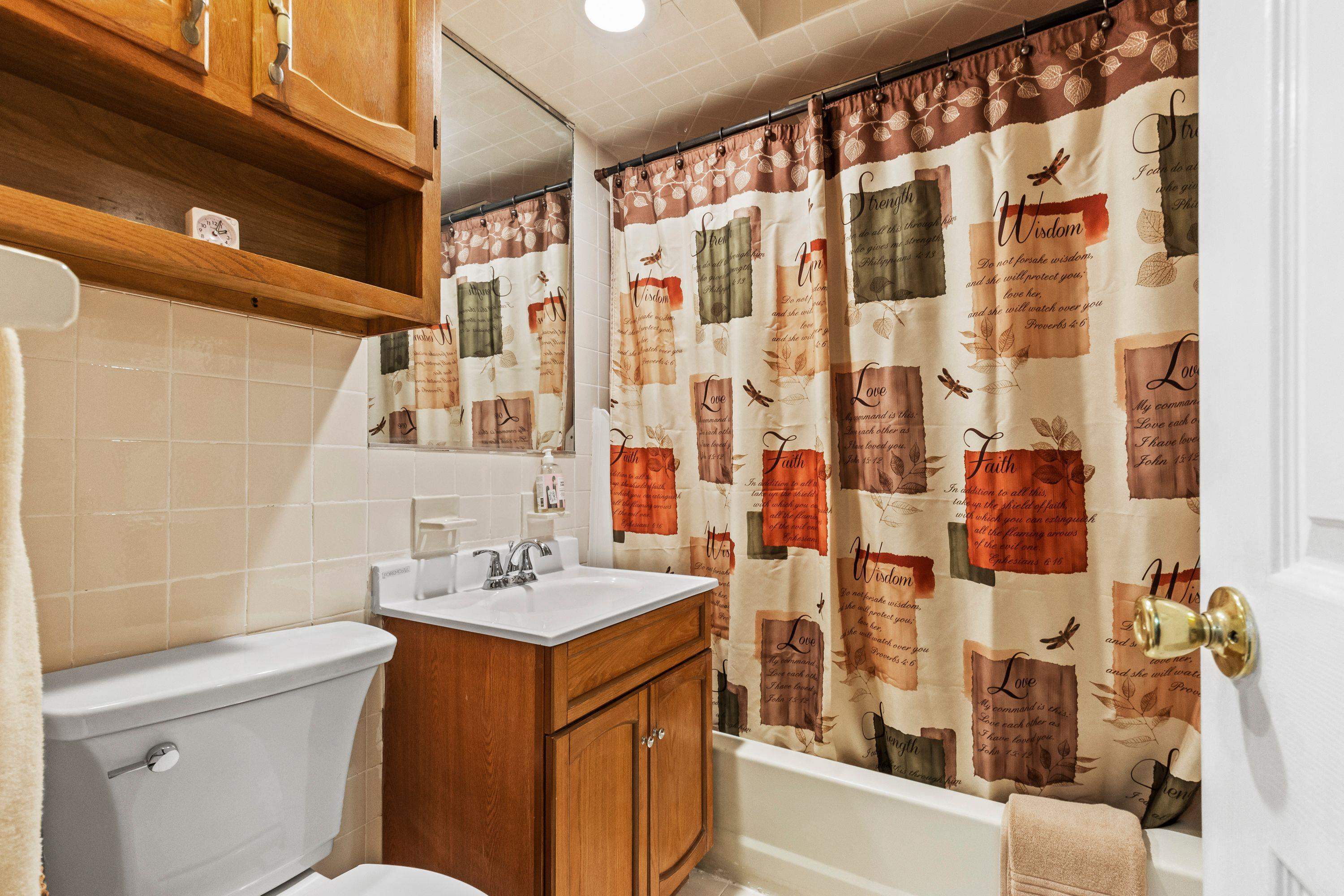 108 Country Village Road Jersey City, NJ 07305 - Photo 10 of 12 a bathroom with a sink and a shower